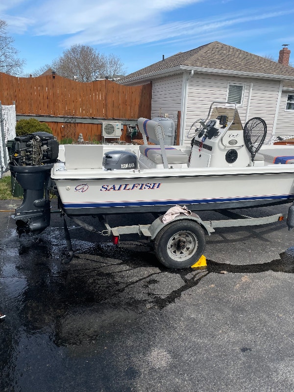 2000 sailfish 16 ft Center Console boat and trailer Powerboats