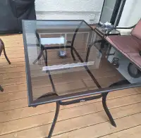 Glass outdoor patio table