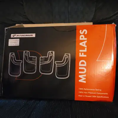 Four piece front and rear mud flaps new in box