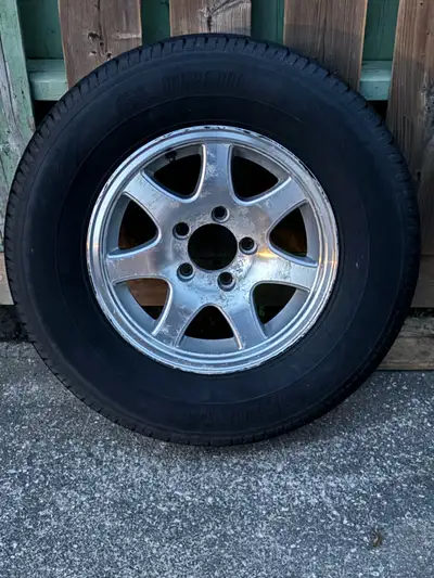 Selling a 14” wheel and tire from a Gulfstream trailer. Tire has no cracking or sun damage and was u...