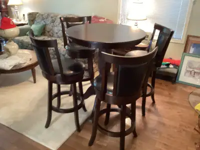 Awesome looking pub style table and 4 high chair stools with comfortable padded seats Table 36” D 42...