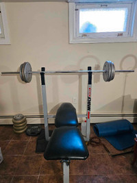 Selling my bench press bench with some weights