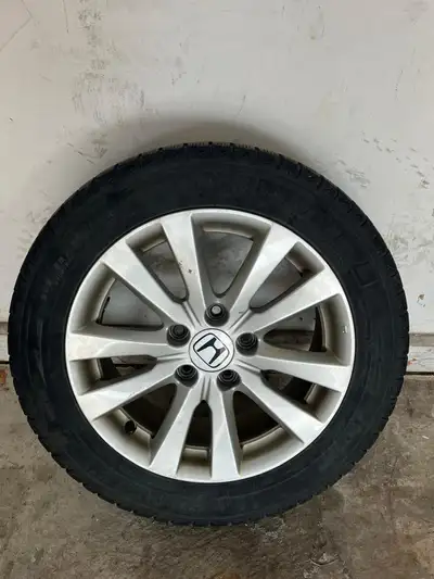 Selling a set of 4 Michelin 205/55R16 winter tires with original Honda factory alloy rims. Used but...