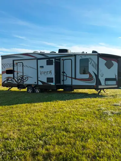 2013 31' Forest River XLR Viper toy hauler for Sale. - 20' Awning - Rear door turns into a deck with...