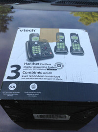 NEW V tech 3 phone system with answering machine for sale