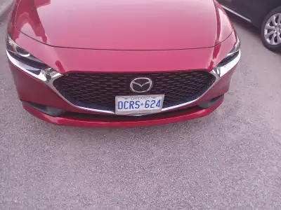2025 Mazda 3. Affordable luxury car. 191 Horspower engine with auto transmission. crystal red paint...