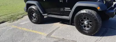 5 Jeep rims with tires. 5x5 bolt pattern P285/70R17 MS