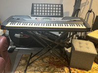 Yamaha piano with stand PSR-GX76