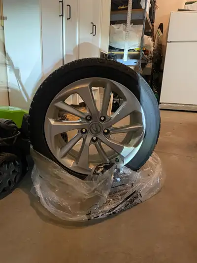 Selling a set of 4 almost brand new Michelin X-Ice winter tires, size 215/45R17. They were purchased...