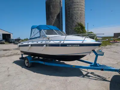 I am selling our 1989 wilker weekender. 305 mercruiser V8 with an alpha one OutDrive and evinrude 8h...