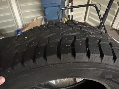 One Set of 4 USED studded winter tires for sale. in really good condition $250