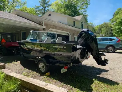 Very stable wide platform. Tall windshield. The back can flip from 2 seats to a flat deck. 2 live we...