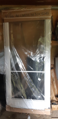 Storm Door, Brand New, LHH, White, 35" by 82"