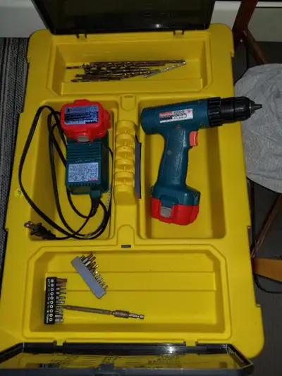 Cordless drill with Stanley tool caddy and some assorted bits, View more