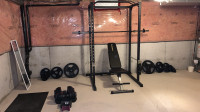 Home Gym. Squat rack with barbell, plates and bench included
