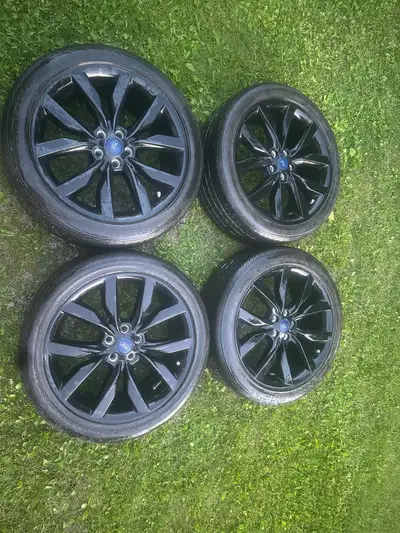 Black rims(4) 3 tires one blown out Text 7809759679