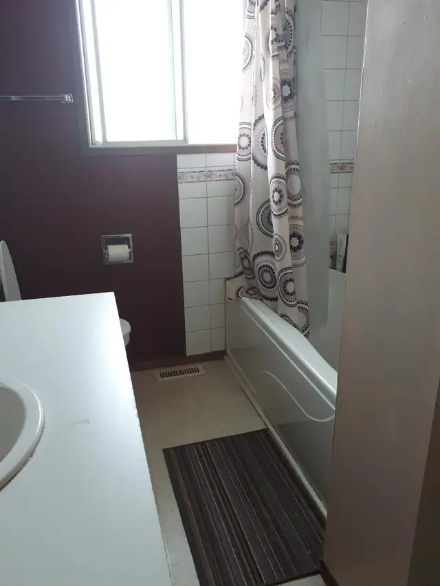 large room huge window utilities included July 1st kelowna62863330795139124
