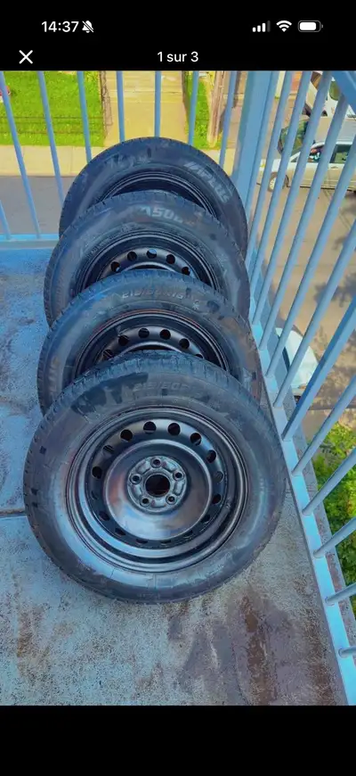 Durable winter tires with a 215/60R16 size. This set of four Aplus tires is mounted on black steel r...