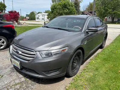 2013 Ford Taurus as is.