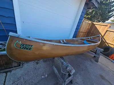 This is a lake or cottage canoe. Made of light weight kevlar composite materials. It's 15 ft long 38...