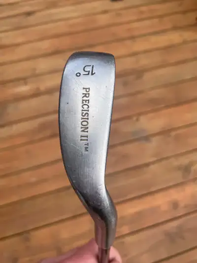 This is a used Precision II Power Iron, 15 degree wedge golf club with a graphite PLUS low torque sh...