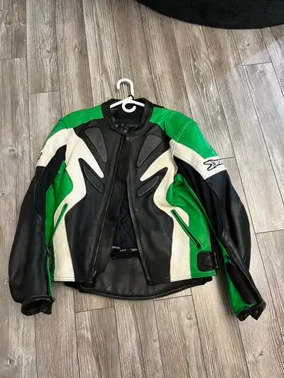 Joe Rocket leather biker jacket, lined with built in support pads. No scuffs no rips great shape. No...