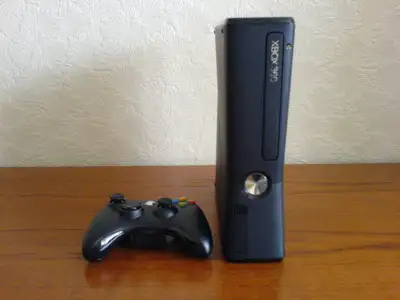 Xbox 360 Slim jtagged/RGH3 modded with freestyle dash 3 Tons of games and emulators Xbox 360 games,...