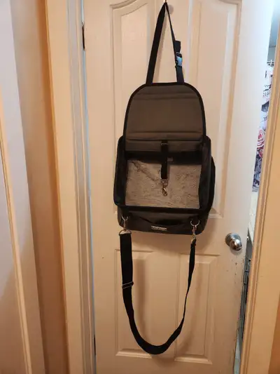 Dog Top Paw Car Seat. Used twice. Includes a tether, front and side pockets, strap on top that goes...