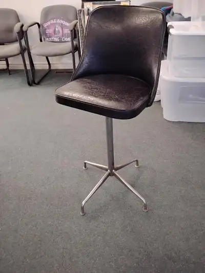 Black plastic swivel bar stool height40" width16" depth15", View more