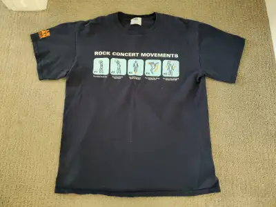 NOTE: Some cracks in the graphic on the shirt, please see attached pictures. I am selling a Blue Man...