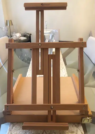 CONDA Premium Wooden Easel Brand New, Never Used. Price is Firm. If you see the AD, it’s available.