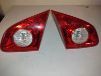 2009 to 2013 Nissan Rogue - Trunk Lid Taillights