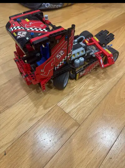 Get ready to rev up your collection with this LEGO Technic #8041 Race Truck! While it has seen some...