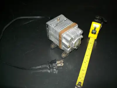 This pump works well and is made by a reliable manufacturer. The air comes out that small nipple on...