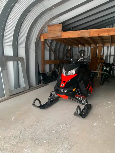 -163 track 2.5 inch paddle Sled is in great shape and needs nothing. Comes with skidoo bar bag, skid...