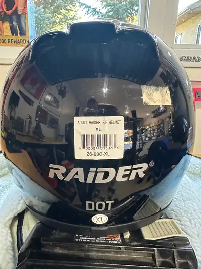 Adult XL Raider helmet. Very good condition. Seldom used. Comes with plush lined carry bag in black...