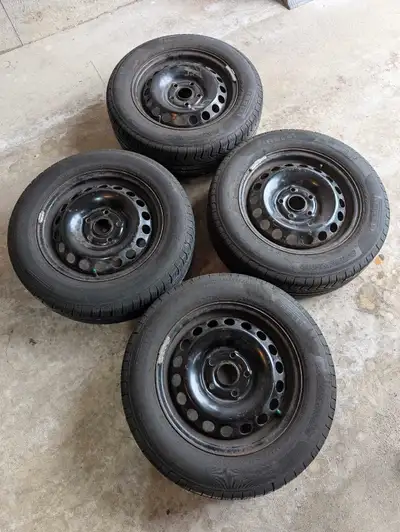 Set of pirelli plus P4 all season tires with steelies purchased from Costco. Lots of life left, DOT...