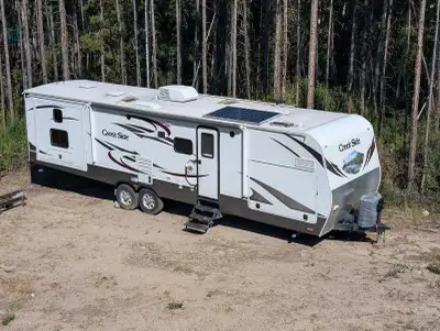 2014 outdoors RV 4 season travel trailer. Trailer is 38 feet in total length with separate front and...