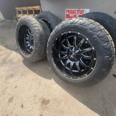 Set of brand new 22x12 8x165 fast rims gor chevy or dodge on 75% tread Toyo open country 325/50/22 t...