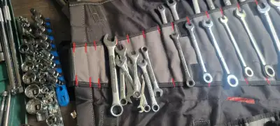 This Westward tool roll set is in good condition and includes a variety of essential hand tools, per...