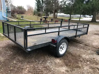 6x12’ solid utility trailer 6 months old 3500 lb single axle Checker board plate 2” hitch Epoxy prim...