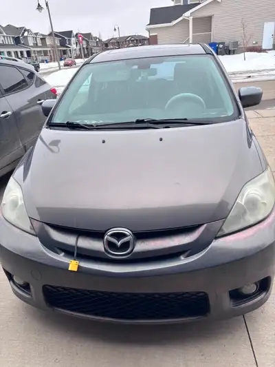 This well maintained 2007 Mazda 5 offers the perfect balance of practicality, comfort, and economy....
