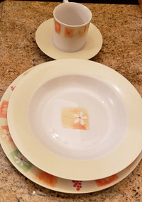 Point zero 16-Piece Dinnerware Set. Plates mugs