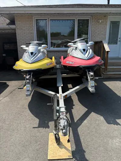 2 2003 supercharged Seadoo Gtx. 223 hours on red and 155 hours on yellow. Superchargers were rebuilt...