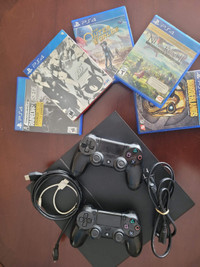 PS4 console 500GB with 2 controllers and 5 games