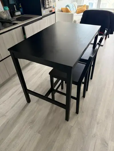 Selling a bar-height dining set from IKEA in excellent condition. Purchased about a year ago and lig...