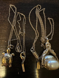 Vintage two gold tone chains with pendants J. Crew and 1928