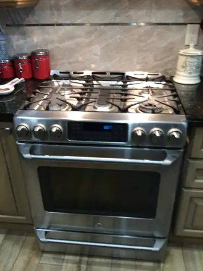 GE Cafe Gas Stainless Steel Gas Stove, Electric Ovens, Self Cleaning, Bottom Drawer Also Bake Oven....