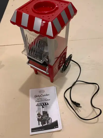 Betty Crocker movie nite hot air popcorn machine. Given as a gift but never used.