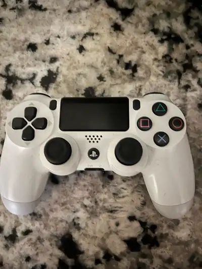 Level up your gaming experience with this pre-owned Sony PlayStation DualShock 4 wireless controller...